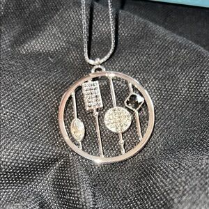 Touchstone Crystal Silver Musical Pendant Necklace